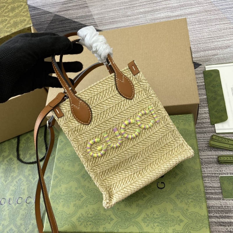 G*u*i top handle bags